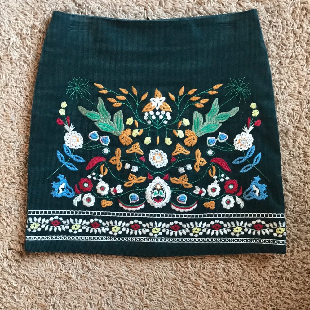 Corduroy skirt with front embroidered detail